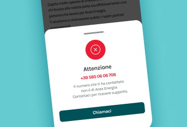 Schermata di smartphone con segnalazione di truffa